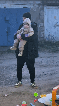Family moments documented in Noviy, Russia during spring afternoon