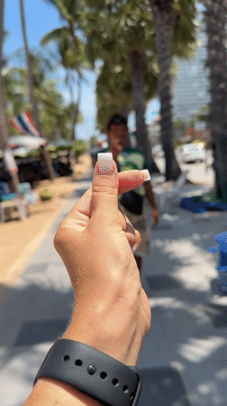 Heart gesture and toddler moments captured in Pattaya