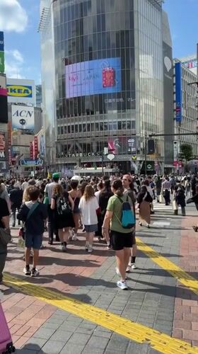 Morning rush hour unfolds at Tokyo's bustling Shibuya crossing