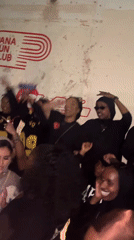 Young people dance at London club, Brazil jersey spotted