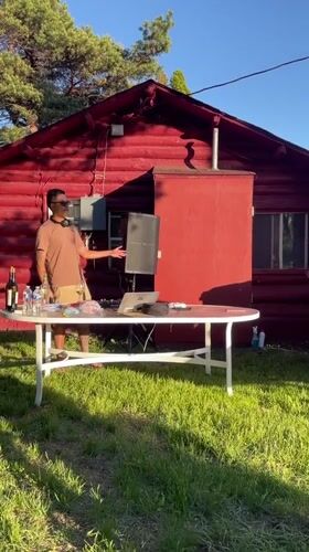 DJ performs midnight outdoor set in Charlevoix, Michigan