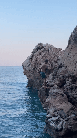 Cliff jumping and coastline exploration along Kemer's rocky shore