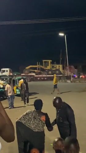 Nighttime street market activity in Bukuru, Nigeria