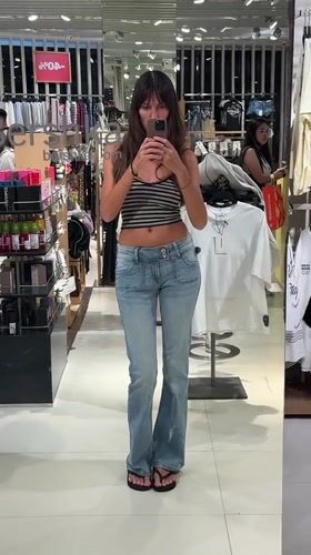 Mirror selfie and lollipop lights at a Kuta shopping spot