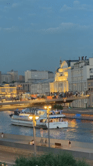 Moscow evening captures tourist boat and bicycle shop scenes