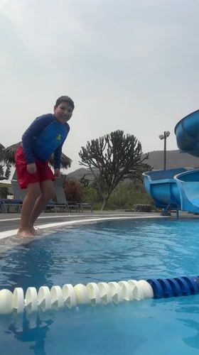 Swimming pool leisure activities documented in Ate, Peru
