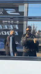 Train passenger films selfie video in window reflection