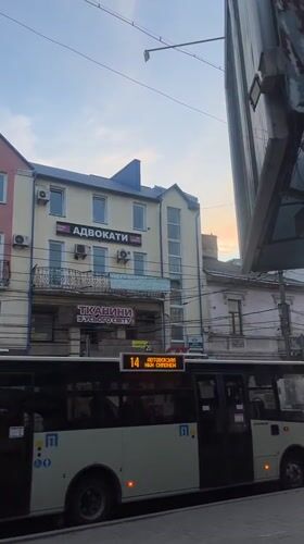 Quiet afternoon in Ternopil features sleepy cat, street scenes