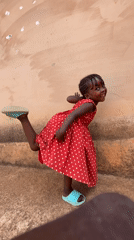 Children play outdoors in sunny Kuru Dungus, Nigeria