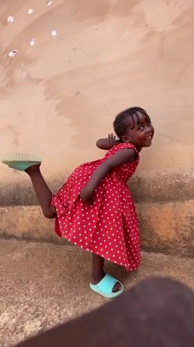 Children play outdoors in sunny Kuru Dungus, Nigeria