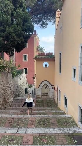 Afternoon tourism and leisure scenes documented across Taormina, Italy