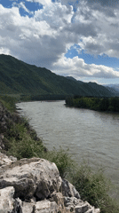 Climber documents river views from rocky heights near Edigan