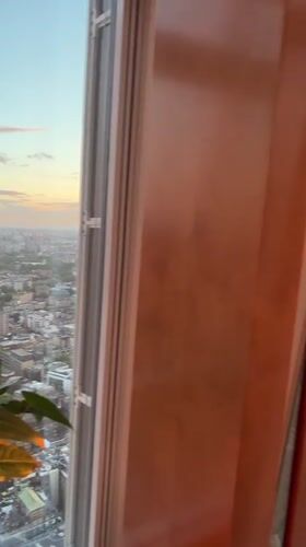 London sunset captured from high-rise building window