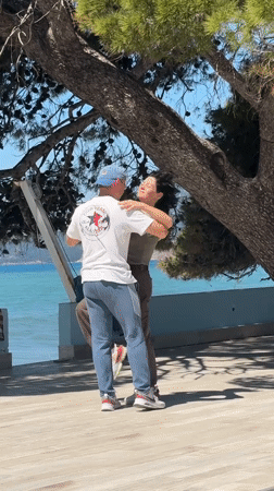 Couple dances, beachgoers enjoy sunny morning in Bar, Montenegro