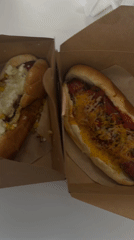 LA resident documents specialty hot dog meal from downtown high-rise