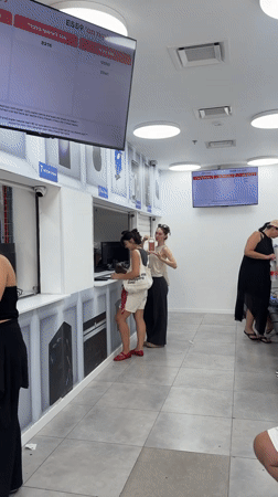 Morning scenes documented across Eilat's marina, shops, government offices