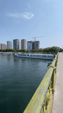 Cruise boats on the Seine with the Eiffel Tower in view