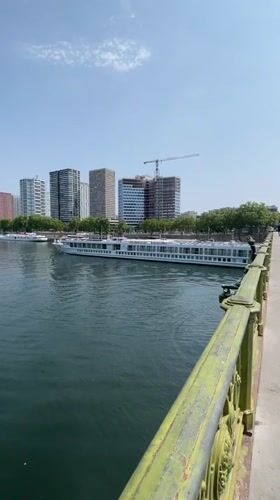 Cruise boats on the Seine with the Eiffel Tower in view