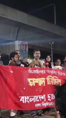 Nighttime public gathering with speakers in Dhaka, Bangladesh