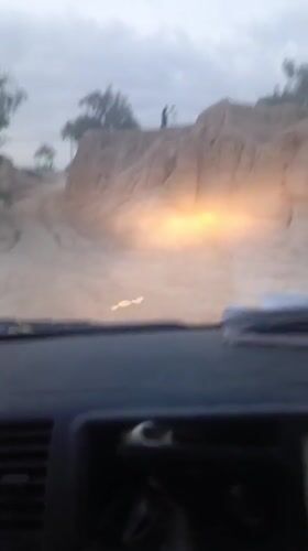 Vehicle travels rough roads near Bannu, Pakistan construction area