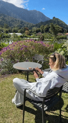 Relaxing on a lawn in Sukasada's mountain countryside