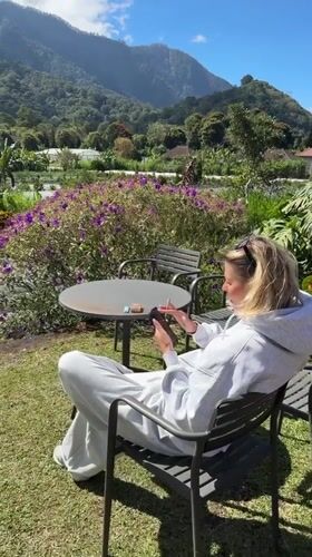 Relaxing on a lawn in Sukasada's mountain countryside