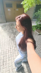 Woman walks through Stara Zagora morning streets