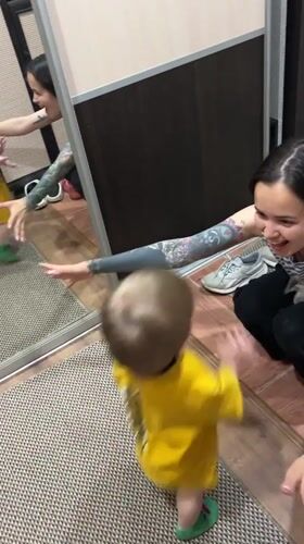 Woman drinks Jägermeister with child and friend in Noviy
