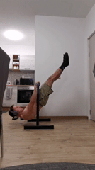 Man performs calisthenics workout at home in Burgas