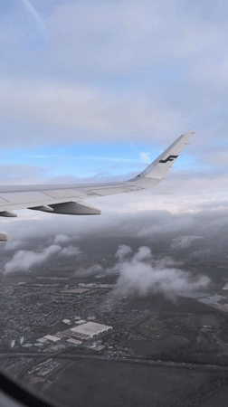 Finnair flight descends over Slough area during morning approach