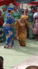 Women dance at outdoor celebration in Sabon Gari West