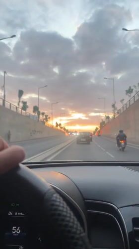 Evening drive captured on Marrakesh roads during sunset