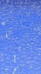 Rain Creates Ripples on Blue Pool Surface