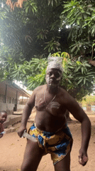 Traditional face paint observed on two men in Minna