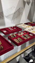 Browsing jewelry and sneakers in a Yerevan retail store