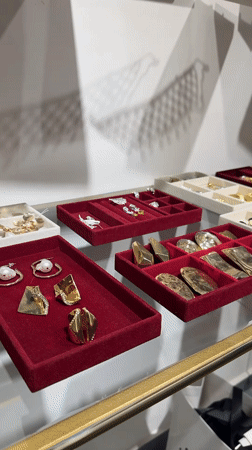 Browsing jewelry and sneakers in a Yerevan retail store