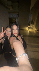 Two women take nighttime selfie in San Pedro Garza García