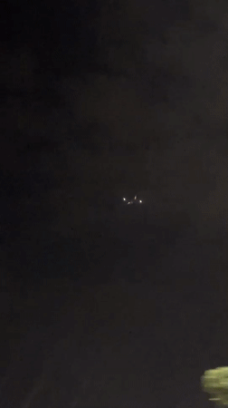Aircraft with bright lights spotted over Morocco night sky