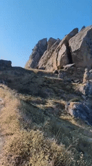 Rocky ruins and arid hillsides at Qalaşıxı, Azerbaijan