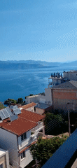 Aegio rooftop views mixed with unrelated promotional content