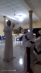 White-robed religious gathering documented in Lagos neighborhood