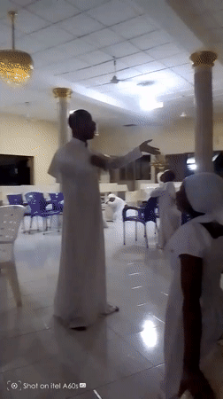 White-robed religious gathering documented in Lagos neighborhood