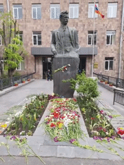 Tumanyan statue in Yerevan decorated with flowers April 24