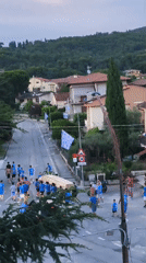 Traditional procession through Passignano sul Trasimeno at dusk
