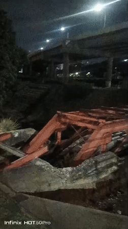 Nighttime scenes across Caracas show collapsed bridge, pedestrian activity