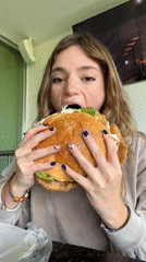 Woman enjoys oversized sandwich dinner in Mexican town