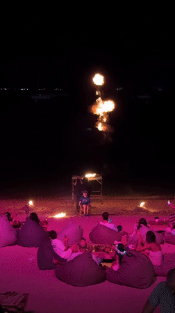 Ko Samui beach party: fire shows, DJ, fireworks, and beanbag crowds