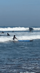 Late night surfing activity documented in Kuta, Indonesia