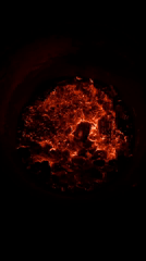 Late-night fire burns in metal pit in Arica, Chile