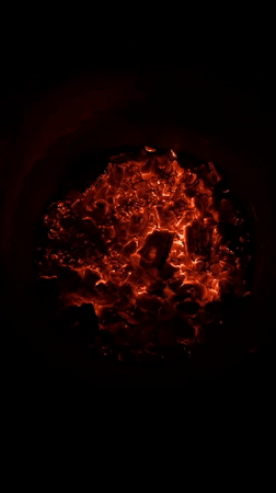 Late-night fire burns in metal pit in Arica, Chile